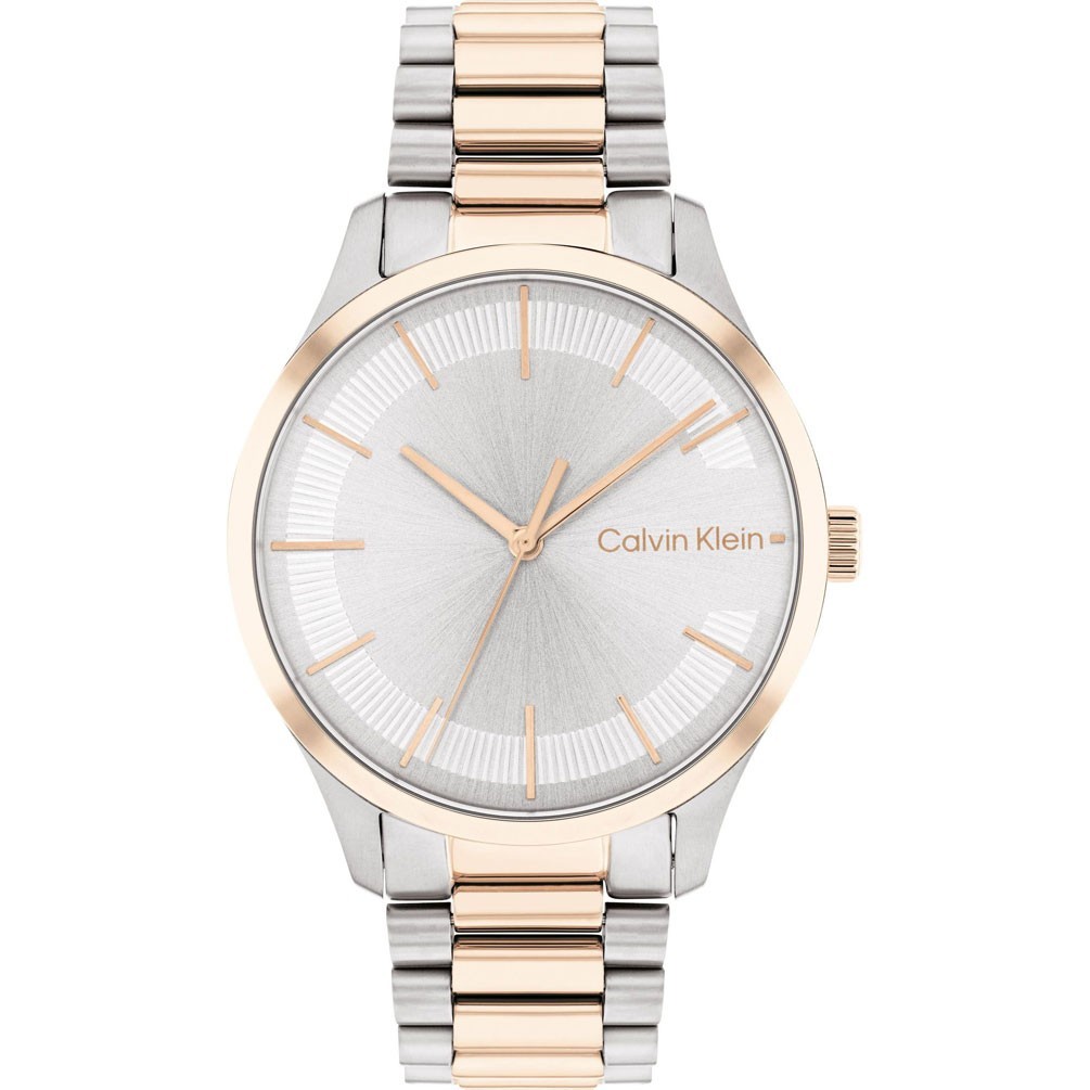 Reloj de Calvin Klein con 3 agujas caja de acero inoxidable tono oro rosa de 35 mm de diametro esfera plateada con indices y agujas en tono oro rosa. El brazalete es